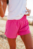 beige hour sunrise performance shorts in azalea are high-waister running shorts